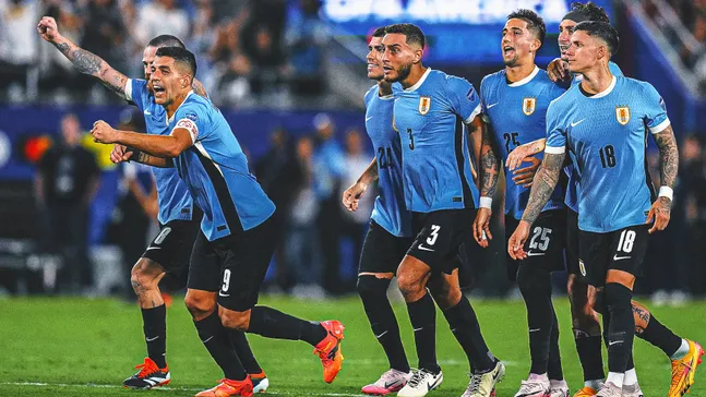 uruguay players celebrate in penalty shootout against canada